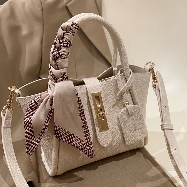 Elegant Ivory Litchi-Pattern Handbag with Gold Lock & Silk Scarf Strap