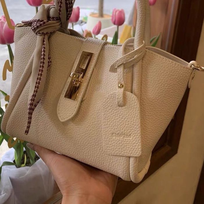 Elegant Ivory Litchi-Pattern Handbag with Gold Lock & Silk Scarf Strap