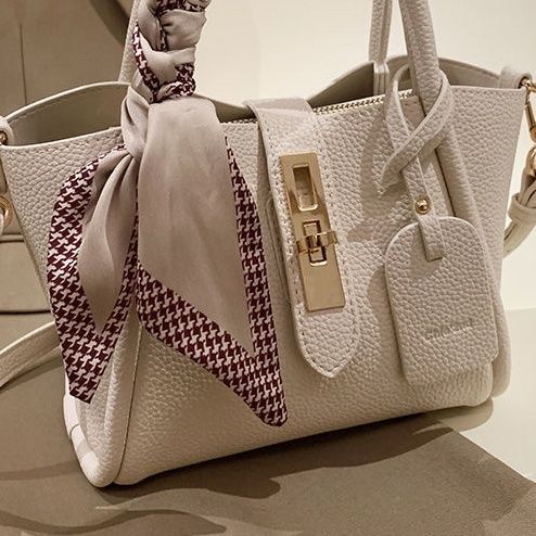 Elegant Ivory Litchi-Pattern Handbag with Gold Lock & Silk Scarf Strap